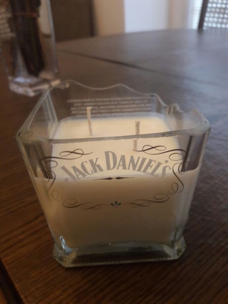 a candle sitting on top of a wooden table