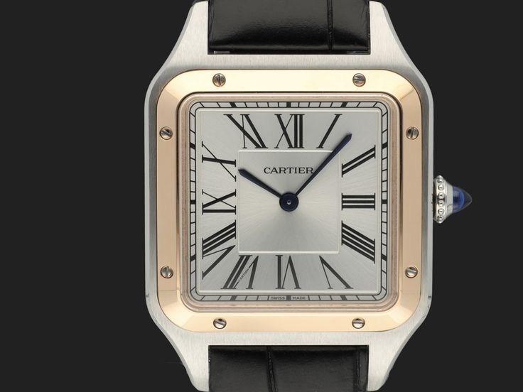 The Cartier Santos was introduced in 1911 and is considered to be the first men’s wristwatch. It was designed by Louis Cartier and named in honour of aviation pioneer Alberto Santos-Dumont, after he wore early prototypes of the watch during his flights. The square case design was unique for the time and the exposed screws around the bezel held the glass in place and were intended to resemble the legs of the Eiffel Tower. Combined with a highly legible dial, it enabled early pilots to quickly rea Cartier Santos Dumont, Cartier Santos, Patek Philippe Nautilus, Breitling Navitimer, Rolex Day Date, Audemars Piguet Royal Oak, Rolex Gmt, The Eiffel Tower, Rolex Daytona