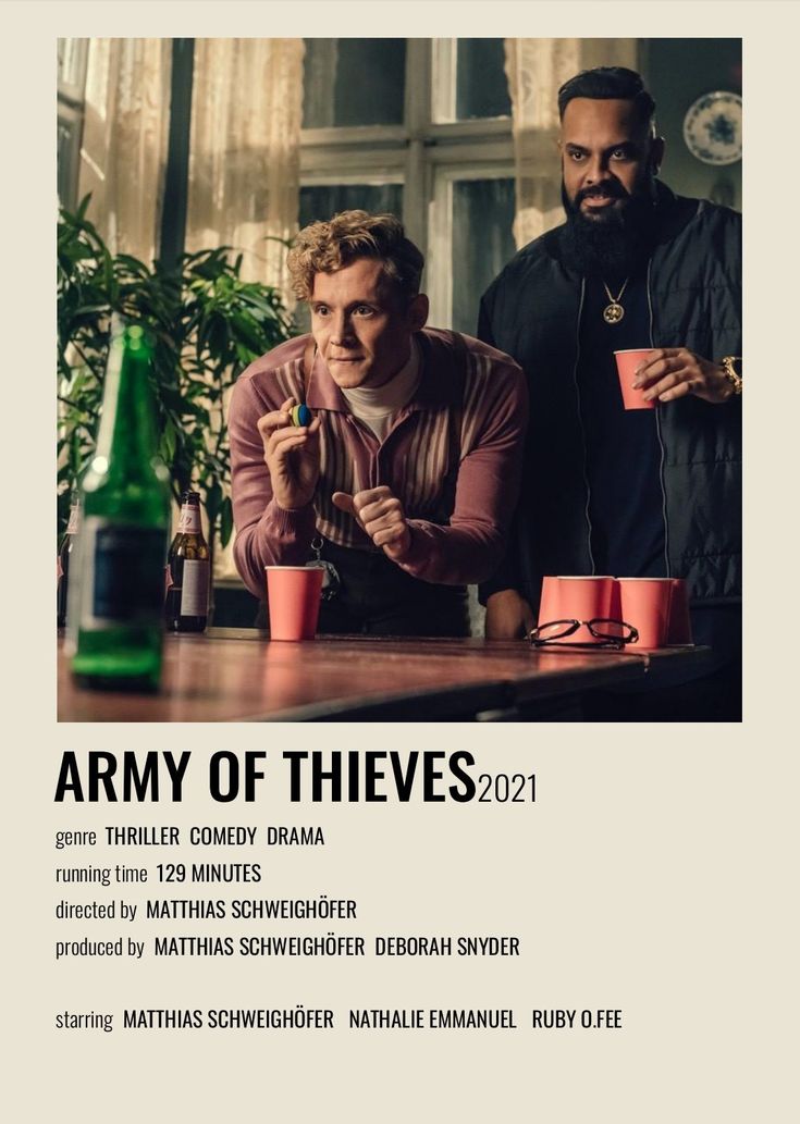 two men sitting at a table with drinks in front of them and the words army of thieves