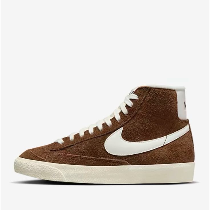 Brand New Styled For The '70s. Loved In The '80s. Classic In The '90s. Ready For The Future. The Blazer Mid Delivers A Timeless Design That's Easy To Wear. The Era-Echoing Suede Breaks In Beautifully And Pairs With Bold Branding For A Premium Feel. Exposed Foam On The Tongue And A Special Midsole Finish Make It Look Like You've Just Pulled Them From The History Books. Go Ahead-Perfect Your Outfit. Blazer Mid 77 Vintage, Nike Brown, Nike Blazer Mid 77, Nike Blazer Mid, Nike Blazers Mid, Vintage Suede, Blazer Mid, Newest Jordans, Women Lifestyle