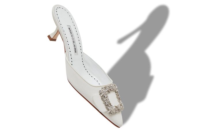 Designer White Crepe de Chine Jewel Buckle Mules - Image Main Elegant Mules With 4-inch Heel And Pointed Toe, Elegant White Mules With 4-inch Heel, Elegant Mules With Branded Heel Counter And Almond Toe, Elegant Almond Toe Mules With Branded Heel Counter, Luxury White Kitten Heels, Elegant Heels With Single Toe Strap For Wedding, Elegant Single Toe Strap Heels For Wedding, Elegant Wedding Heels With Single Toe Strap, White Luxury Formal Mules