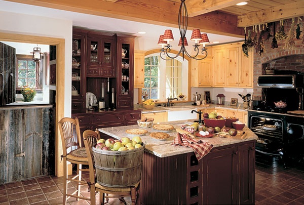 a kitchen with an island, stove and oven in it's centerpieces