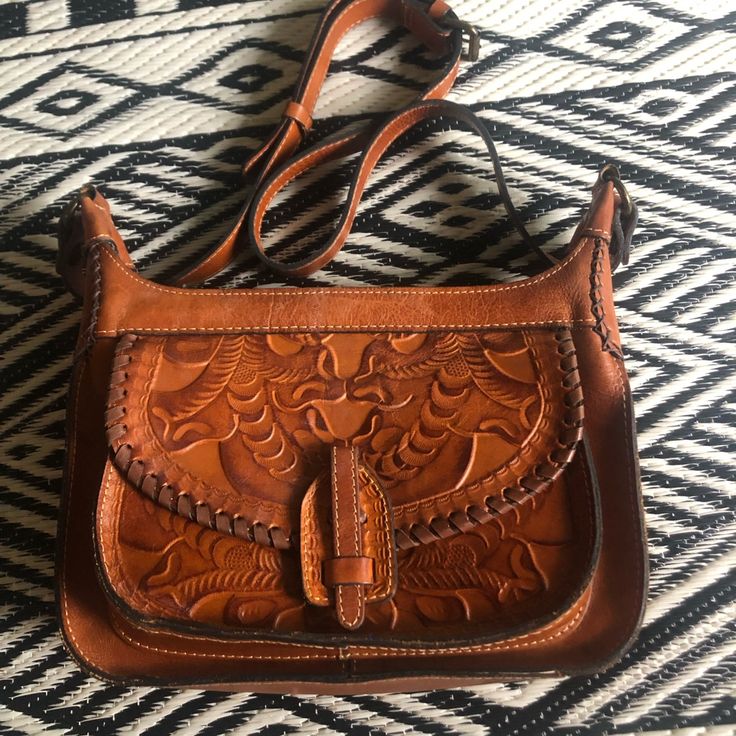 Beautiful Patricia Nash Brown Stamped Leather Boho Bag With Adjustable Strap Tons Of Pockets And Zippers To Keep Everything Secure Comes With A Dust-Bag!! Measures 12 X 9 X 3 Great Bohemian Piece To Add To Your Wardrobe. Can Wear Year Round As It’s A Beautiful Rich Leather Tones. Whipstitch Around Front Pocket With A Snap Opening Stamped Leather, Suede Purse, Boho Bag, Front Pocket, Adjustable Straps, Dust Bag, Jewelry Accessories, Bag Lady, Purse