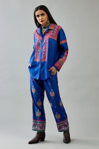 Blue silk shirt with multicolour cutwork and thread embroidery, embellished by mirrorwork. Comes with matching pant. - Aza Fashions Blue Silk Shirt, Pant For Women, Pant Women, Thread Embroidery, Blue Silk, Silk Thread, Cut Work, Silk Shirt, Embroidered Shirt