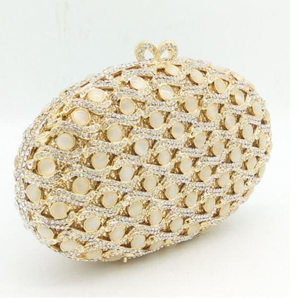 Item Type: Clutch Gender: Women Material: Polyester, Artificial Pearl, Metal Style: Fashion Closure Type: Hasp Size: 19 x 5 x 12 cm / 7.48 x 1.97 x 4.72 inch Package Includes: 1 x Pc Gold Evening Bag With Bling For Party, Glamorous Gold Clutch With Chain Strap, Gold Metal Evening Bag For Parties, Gold Metal Bag For Party, Gold Metal Evening Bag For Events, Chic Gold Metal Evening Bag, Elegant Gold Metal Evening Bag, Chic Gold Embellished Evening Bag, Gold Metal Party Bag