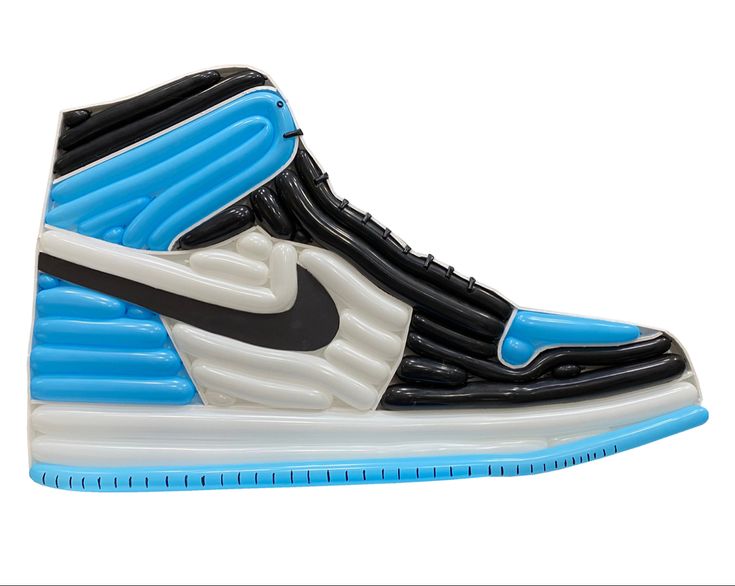 the nike air jordan 1 high top sneaker is painted in black, blue and white