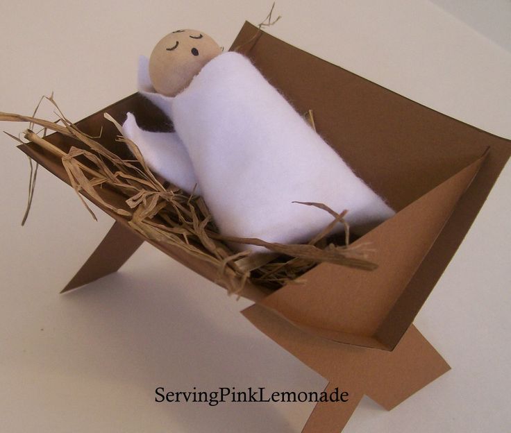 a small stuffed animal in a cardboard box