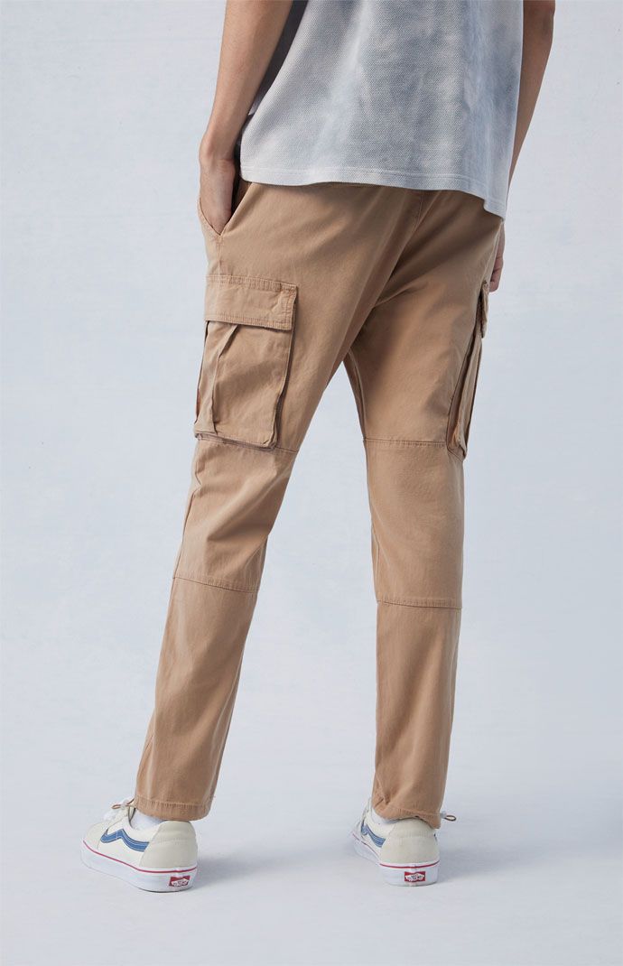 Bring any casual 'fit together with the new Eco Stretch Canvas Khaki Slim Cargo Pants from PacSun. This go-to pair is designed with an elastic stretch waistline, adjustable drawstrings, side pockets, cargo pockets, and a standard fit.

Learn more about PacSun eco items Khaki Cargo Jeans With Elastic Waistband, Utility Straight Leg Joggers With Pockets, Utility Straight Leg Joggers With Elastic Waistband, Utility Joggers With Elastic Waistband And Straight Leg, Utility Style Straight Leg Joggers With Elastic Waistband, Khaki Utility Joggers With Pockets, Utility Joggers With Tapered Leg And Pockets, Khaki Stretch Tapered Leg Cargo Pants, Stretch Khaki Tapered Leg Cargo Pants