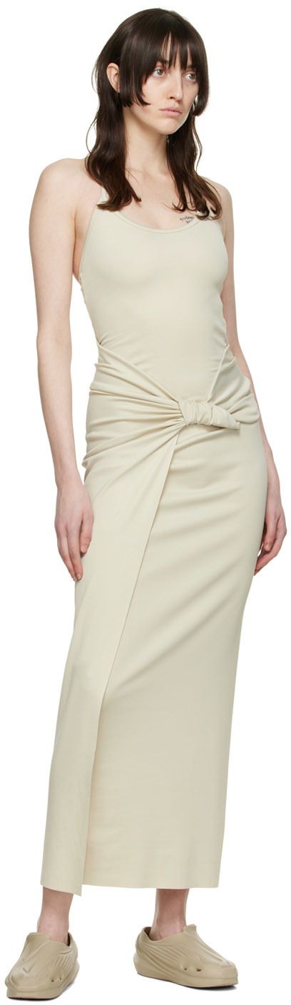 Plain-woven stretch nylon dress. · Halter neck · Knotted accent and pleat at front Supplier color: Natural light Fitted Beige Pleated Midi Dress, Beige Structured Fitted Dress, Beige Pleated Skirt Dress, Workwear Midi Dress With Folds, Dress Halter Neck, Nylon Dress, 1017 Alyx 9sm, Dress Halter, Halter Neck