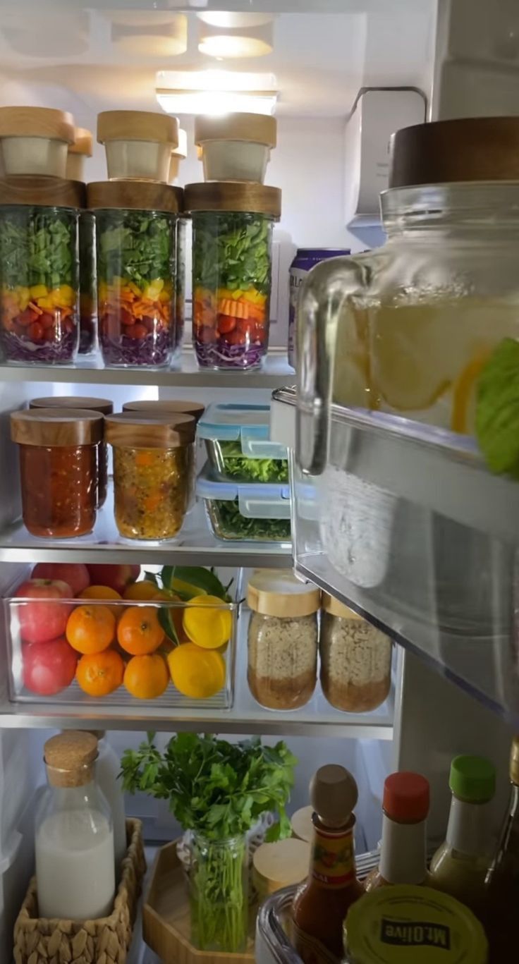 an open refrigerator filled with lots of food