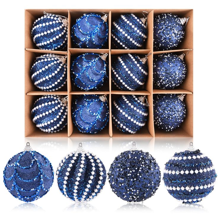 blue and white christmas ornaments in boxes on a white background stock photo - 1387982