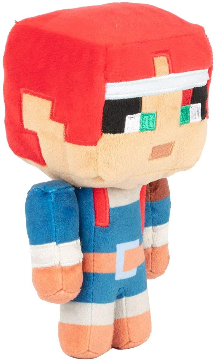 a small stuffed toy is wearing a blue and orange outfit