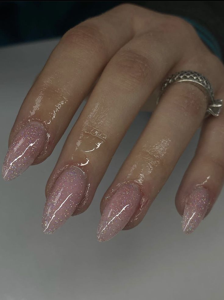 Glittery Classy Nails, Clear With Sparkle Nails, Sheer Sparkly Pink Nails, Glossy Glitter Nails, Pink Glittery Nails Almond, Nude Glitter Nails Almond, Hoco Nails Sparkle, Translucent Glitter Nails, Sheer Sparkly Nails