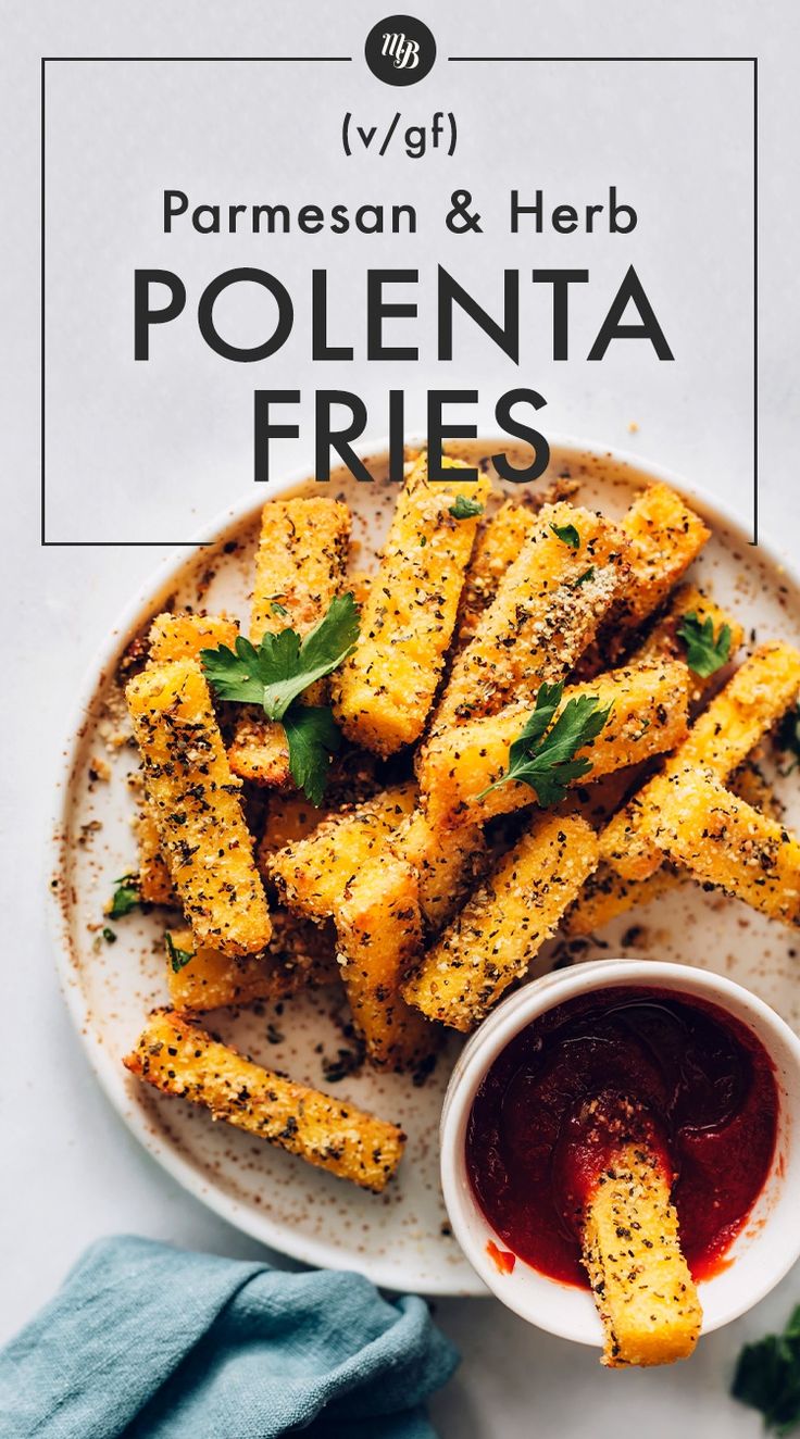 parmesan and herb polenta fries on a plate with ketchup