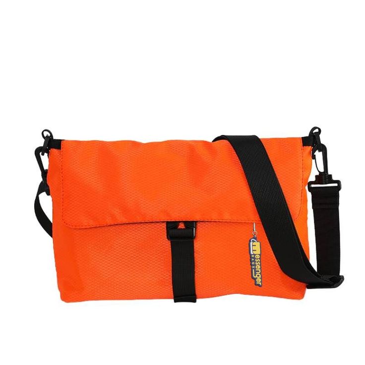 How about two bags instead of one? You'll love our new Small Reversible Messenger Bag in Oxford canvas. Our black and design shoulder bag can also be used as an orange bag thanks to its reversible aspect. Let yourself be tempted by this trendy design accessory! A small reversible messenger bag for all needs Men love our Small Reversible Messenger Bag, a shoulder bag that can be reversed to change colors. You're bound to love this high-end accessory that can accompany you in any situation. At wor Functional Orange Pouch Bag, Functional Orange Crossbody Bag, Casual Orange Bag For On-the-go, Functional Orange Shoulder Bag For On-the-go, Functional Orange Shoulder Bag, Casual Orange Shoulder Bag For On-the-go, Versatile Orange Shoulder Bag With Removable Pouch, Trendy Orange Shoulder Bag For School, Functional Orange Bag With Adjustable Strap