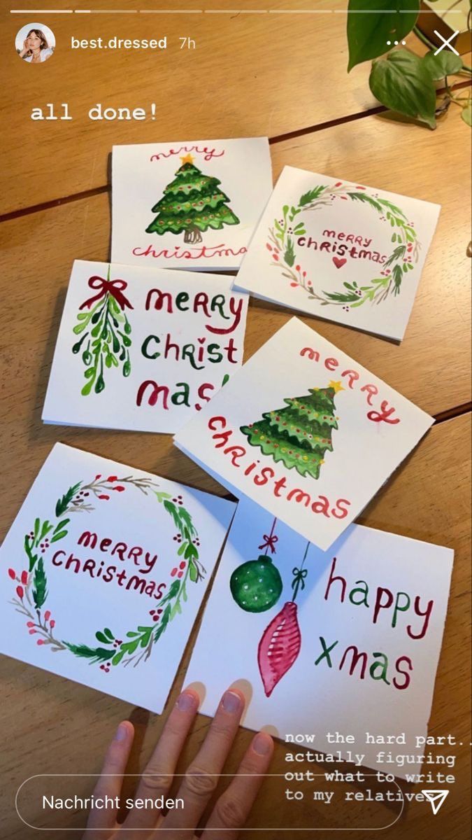 someone is making christmas cards on their phone