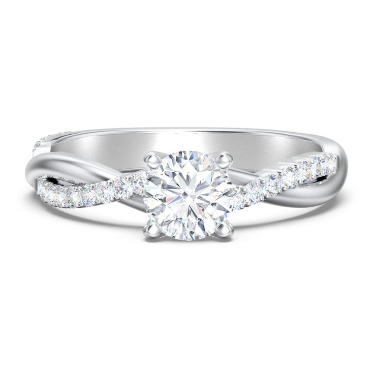 a white gold engagement ring with diamonds on it