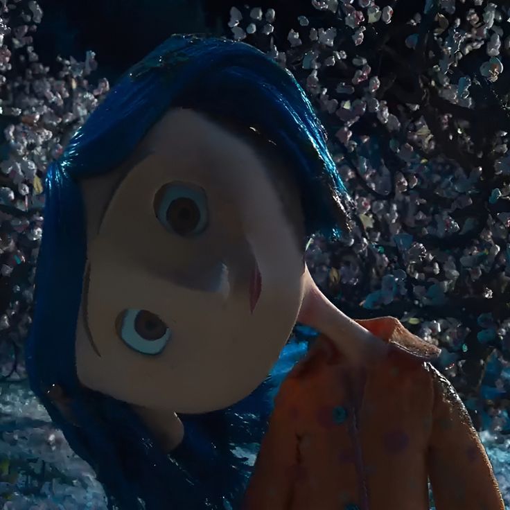 an animated character with blue hair and big eyes