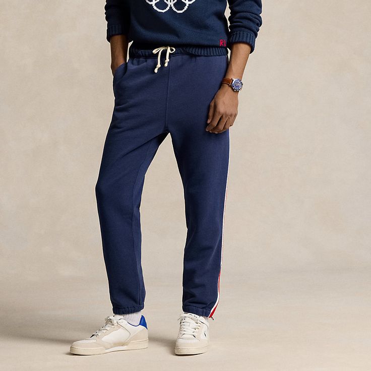 Part of the Polo Ralph Lauren Team USA Collection these classic cotton-blend sweatpants feature braided stripes and a label with the official logo of the U.S. Olympic Team. Casual Relaxed Fit Sweatpants With Three Stripes, Casual Cotton Sweatpants With Contrast Stripes, Casual Cotton Bottoms With Side Stripes, Cotton Jogging Pants With Logo Detail, Casual Cotton Joggers With Contrast Stripes, Cotton Sports Pants With Contrast Stripes, Cotton Sweatpants With Three Stripes For Jogging, Casual Joggers With Contrast Stripes, Casual Cotton Sweatpants With Three Stripes