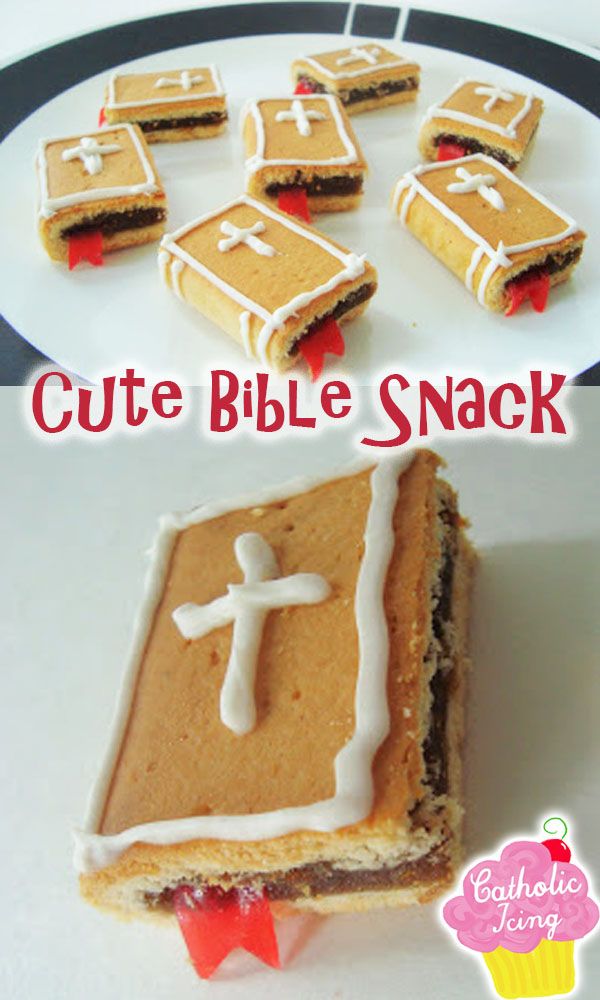 a plate with some cookies on it and a cake in the shape of a cross