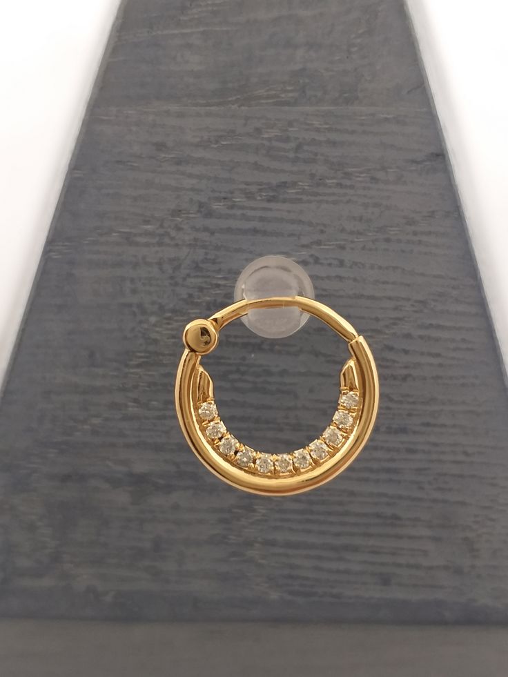 Septum Clicker / Nose ring Natural White diamonds G - VS2 - 1.2-1.3MM Inner Diameter; 6mm,8mm,10mm Septum ring:14g,16g.18g Materials - 14K Solid gold Options gold - 18k solid gold 14k yellow god - 14k rose gold - 14k white gold Options for stones:black diamond,ruby,sapphire,emerald Elegant Hoop Septum Ring For Anniversary, Gold Small Hoop Nose Rings For Anniversary, Yellow Gold Small Hoop Rings With Vvs Clarity, Gold Hoop Septum Ring With Prong Setting, Elegant Everyday Septum Ring, Yellow Gold Small Hoop Ring With Prong Setting, 14k Yellow Gold Septum Ring With Prong Setting, Elegant Gold Small Hoop Septum Ring, Elegant Small Hoop Gold Septum Ring