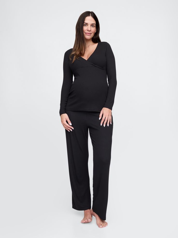 Soft modal-blend ribbed knit maternity pajama set.  Crossover V-neck.  Long sleeves.  Elasticized waist at PJ pants.  Please note: Maternity styles cannot be returned in store.  Please enjoy free returns by mail.  This product was made in a factory that invests in gender equality and women’s empowerment.  Through RISE Reimagining Industry to Support Equality) and Gap Inc. ’s program P. A. C. E.  Personal Advancement & Career Enhancement), we support people who make our clothes to build the skills, knowledge, confidence, and resilience needed to advance in work and life.  Learn more here.  Choose your maternity Maternity Pajama Set, Maternity Styles, Preggo Fashion, Maternity Pajamas, Gap Maternity, Support People, Gender Equality, Pj Pants, Pj Sets