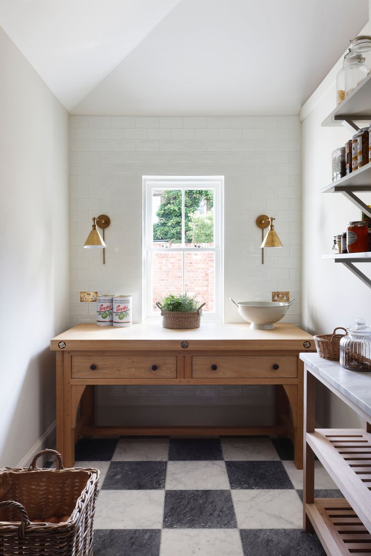 the kitchen is clean and ready for us to use it's counter tops are made out of wood