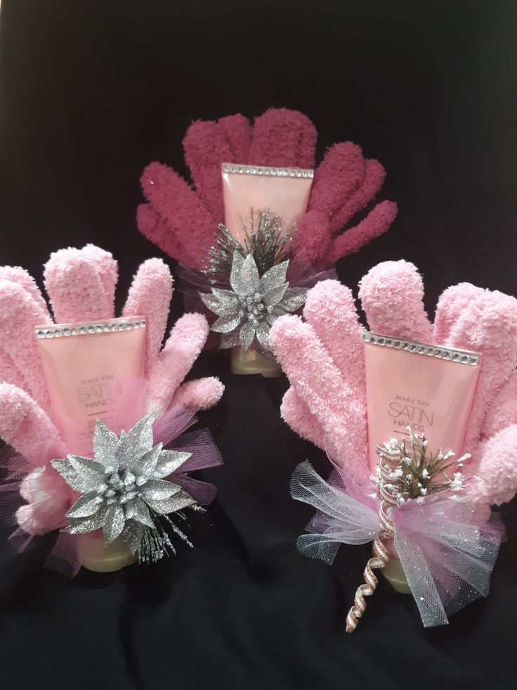 three pink and silver hair accessories on display