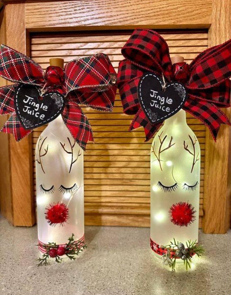 two wine bottles decorated with red and black plaid bows, one has eyelashes on it