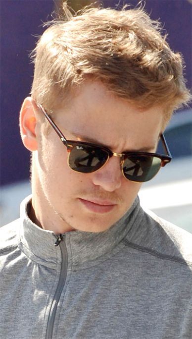 a close up of a person wearing sunglasses