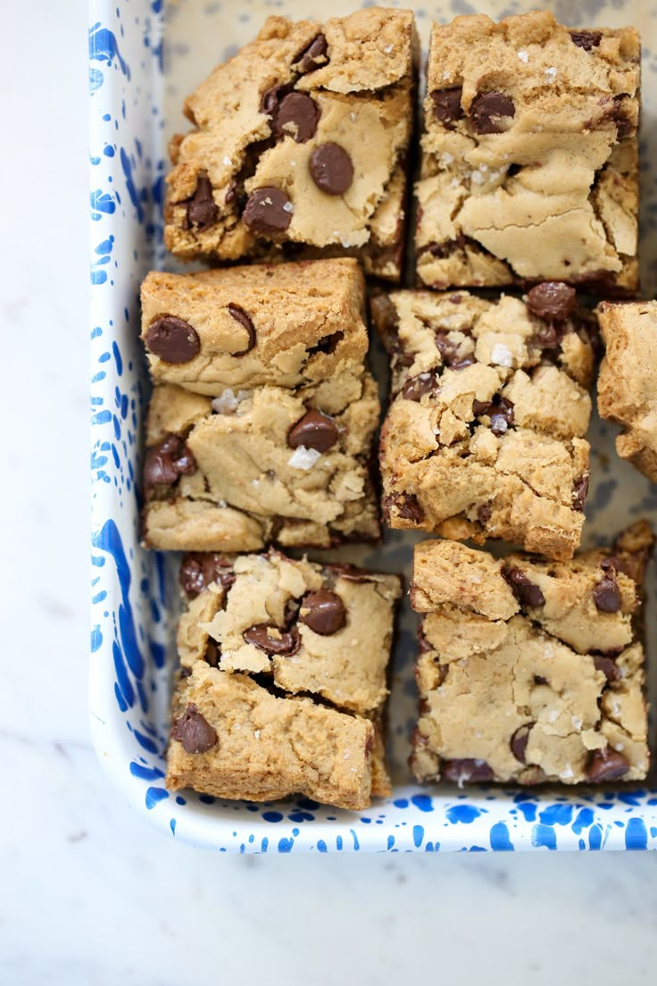 chocolate chip cookie bars in a blue and white dish