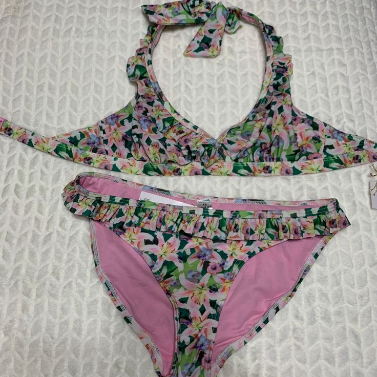 Never Worn Dorothy Perkins Bikini With Tags Attached. Multicolor, Lined With Ruffle Trim. Lily Underwired Bikini Top, Size 6 (Euro Size 38) Lily Ruffle Bikini Bottoms, Size 8 (Euro Size 40) Top & Bottom Can Be Sold Separately ($10 Each Piece) - Please Message Me. Playful Pink Swimwear For Beach Party, Playful Pink Swimwear For Sunbathing, Pink Stretch Tankini For Summer, Pink Stretch Summer Tankini, Playful Pink Triangle Top Swimwear, Pink Halter Neck Tankini For Swimming, Playful Pink Tankini For Beach Party, Pink Fitted Tankini For Spring, Fitted Playful Pink Tankini