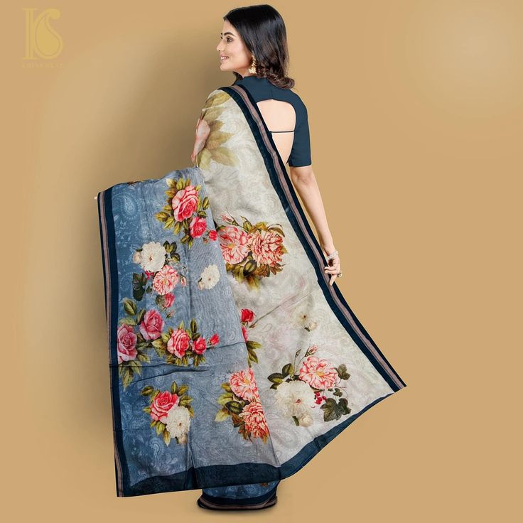 Print sarees are versatile and stylish garments that come in a wide range of prints, including florals, geometric patterns, and abstract designs. They also feature handloom prints like Kalamkari and Batik sarees. These sarees are suitable for both casual and formal occasions and can complement any skin tone. Explore our exclusive collection of print sarees. Floral Print Saree, Digital Print Saree, Floral Digital Print, Floral Print Sarees, Blouse Cotton, Print Saree, Cotton Blouse, Printed Sarees, Grey And Beige