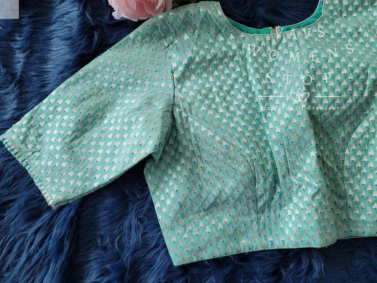 Blouse stitched - Yes Blouse Opening - Back Sleeves Length - Elbow Padded - No Blouse size - 40 with inner margins expandable upto 46 For Blouse Size 38 alteration can be done on request. Fitted Green Formal Blouse, Formal Fitted Green Blouse, Designer Fitted Green Blouse, Elbow Pads, Sleeve Length