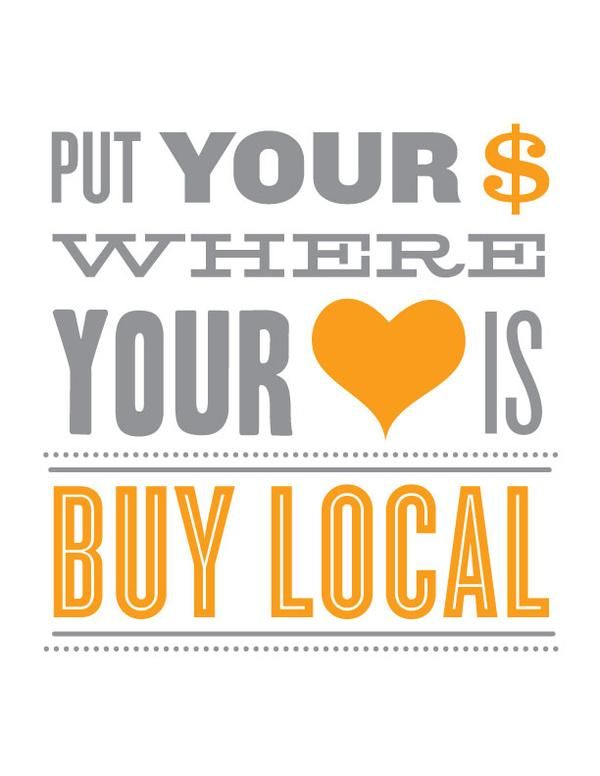 a sign that says put your where your is buy local with a heart in the center