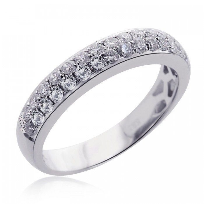 a white gold wedding ring with rows of diamonds