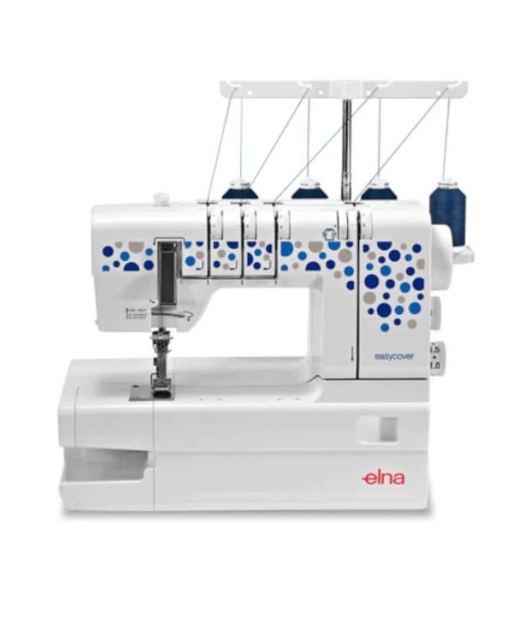 an electric sewing machine with blue dots on the front and bottom, sitting on a white surface