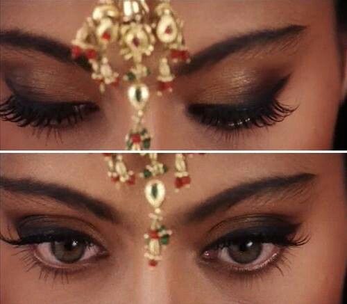 two pictures of the same woman's eyes with gold jewelry on their foreheads