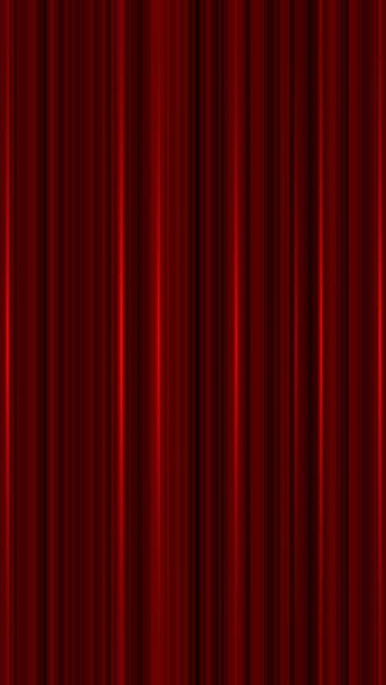 a red curtain that is open to reveal the light and dark colors on it's surface