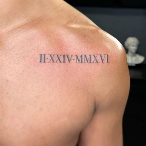 Roman Number Tattoo Men, Chest Roman Numeral Tattoo, Roman Numeral Tattoo Men, Tattoo Between Breast, Tattoo Under Breast, Roman Numbers Tattoo, Thigh Tattoo Men, Roman Tattoo, Roman Numeral Tattoo