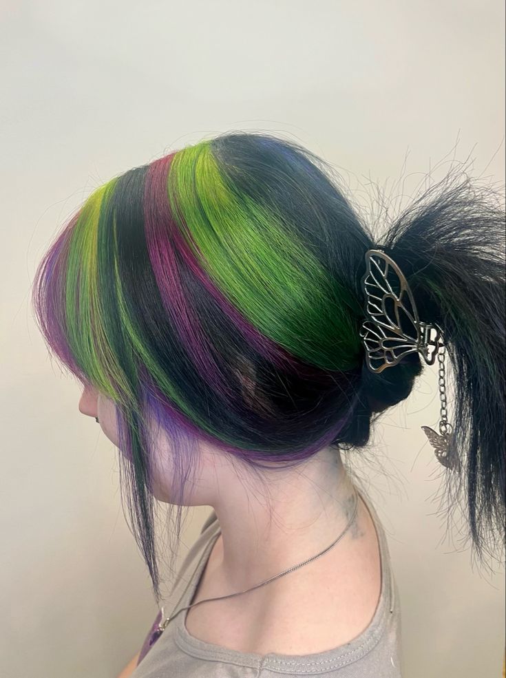 green, magenta, purple, black, striped hair. Chunky highlights Chunky Highlights Scene Hair, Black Hair With Rainbow Streaks, Purple And Green Hair Streaks, Green Black And Purple Hair, Black Hair Magenta Highlights, Cute Hair Colors For Dark Hair, Green And Black Chunky Highlights, Black Hair Colorful Highlights, Green Hair With Blonde Highlights