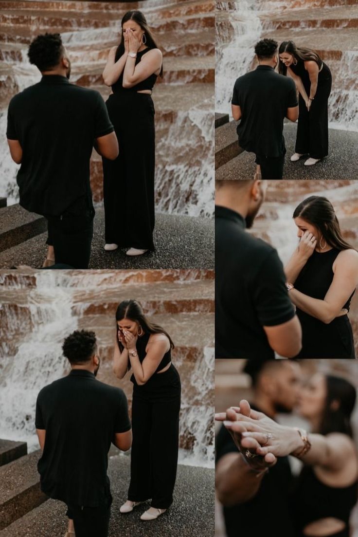 a man and woman standing next to each other in front of a waterfall while talking on their cell phones