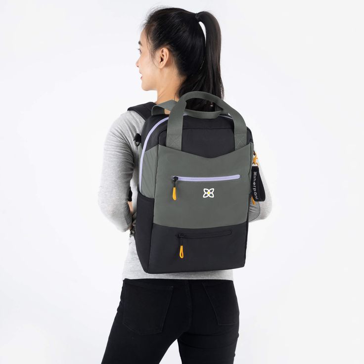 Liter Capacity: 19 Dimensions: 11” x 16” x 5.5” 36 Plastic water bottles diverted from landfills Weight: 1lb 9 oz Materials: 100% Recycled Polyester Water Resistant: Yes Vegan: Yes RFID Protection: Yes Ways to Wear: Backpack, Crossbody, Tote # of pockets: 10 1 Main zippered compartment 1 Padded 15’’ laptop sleeve 1 Interior mesh slip pocket 1 Interior zip pocket 1 Exterior slip pocket with magnetic closure 2 Exterior zippered pockets 2 Exterior water bottle pockets 1 Back slip pocket Tech Compat Functional Rectangular Backpack For Outdoor Activities, Practical Backpack For On-the-go, Functional Everyday Backpack With Top Carry Handle, Practical On-the-go Backpack With Functional Pockets, Rectangular Backpack With Water Bottle Pocket For Outdoor, Rectangular Backpack With Water Bottle Pocket For Outdoor Activities, Functional Large Capacity Backpack For On-the-go, Functional Backpack With Large Capacity For On-the-go, Versatile Backpack With Water Bottle Pocket