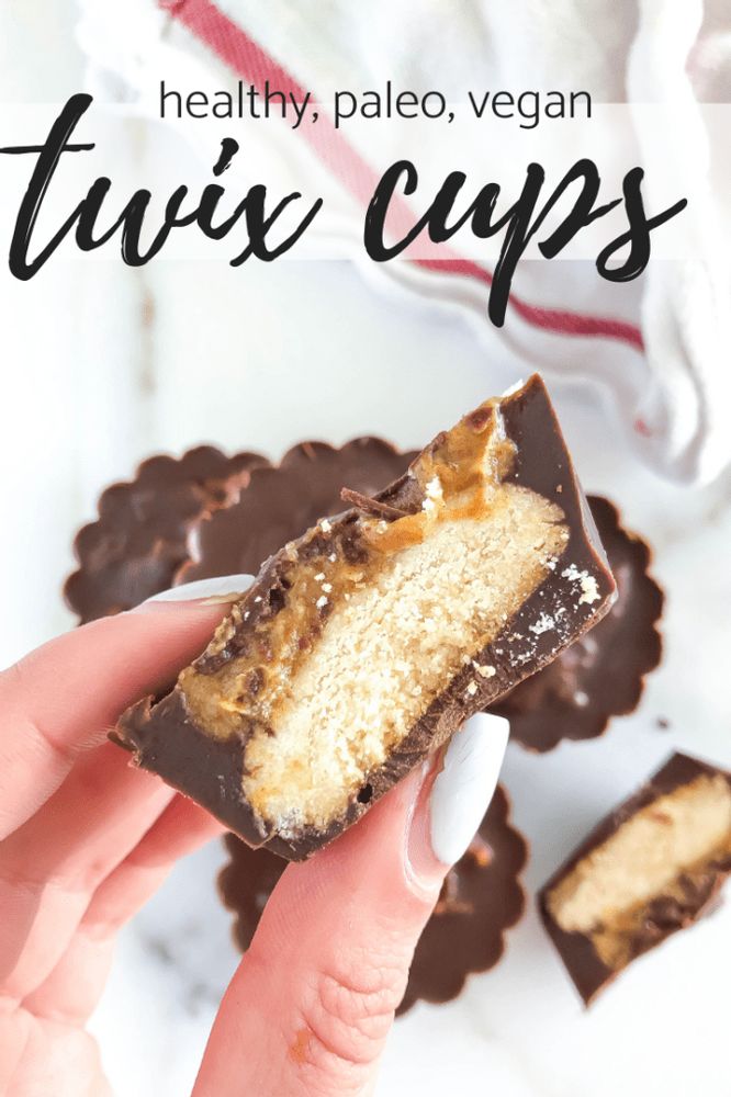 a hand holding a piece of chocolate and peanut butter trufx cups with the title above it