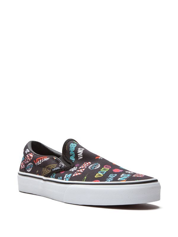 Shop Vans multi-logo slip-on sneakers with Express Delivery - FARFETCH Graffiti Sneakers, Graffiti Designs, Vans Slip On, Vans Shop, Black Canvas, Vans Classic Slip On Sneaker, Slip On Sneakers, Sneakers Black, Logo Print