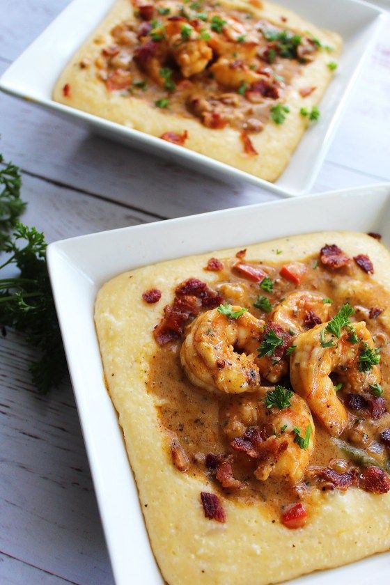 two square white plates filled with shrimp and grits