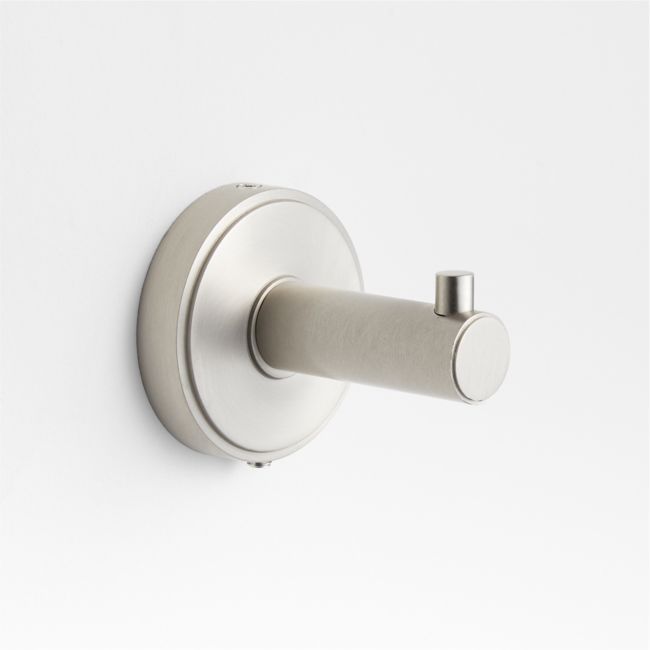 a close up of a wall mounted toilet paper holder