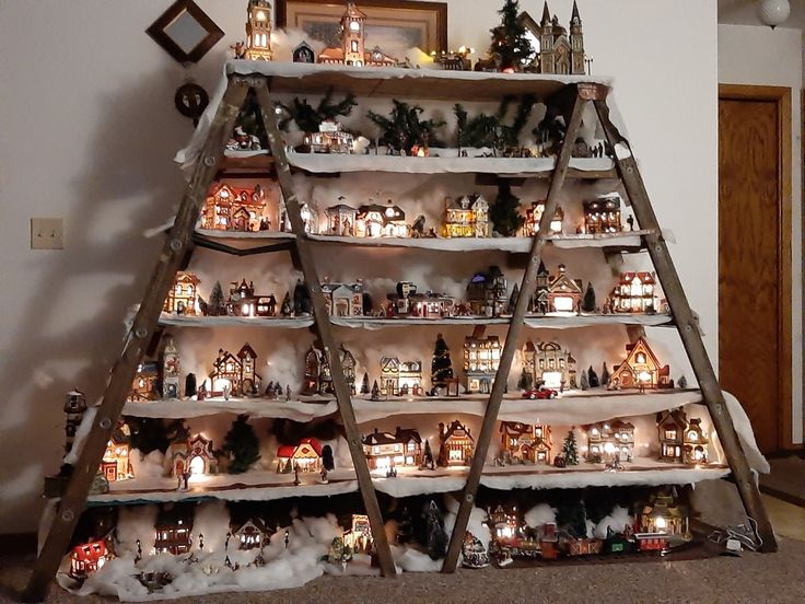 a christmas tree made out of wooden ladders