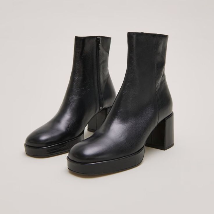 Condition: Brand New | Never Worn Fall For Our Vanves Boots! Their Square Toe And Platform Will Take You From Day To Night! Their Simple, Clean Lines Will Go Perfectly With Your Winter Wardrobe. Heel : 7 Cm Upper Height: 14,5 Cm Calf Circumference : 26 Cm Made In : Portugal Aged Leather | Vanves Size 40 ** The Last 4 Pictures Are Actual Pictures Of The Boots ** Comes With Dust Bag Sleek Platform Boots With Stacked Heel And Round Toe, Black Boots Short, Sleek Platform Boots With Round Toe, Sleek Medium Width Platform Boots With Round Toe, Sleek Medium Width Round Toe Platform Boots, Black Calf Leather Platform Boots With Block Heel, Chic Platform Boots With 4-inch Heel And Round Toe, Black Boots With 4-inch Block Heel, Black Platform Boots With 4-inch Heel