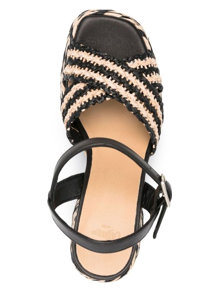 Step up your shoe game with these raffia block heel sandals that are equal parts chic and comfy. Perfect for a day out or a night on the town, they add a touch of effortless style to any outfit. Trust me, your feet will thank you. Black and beige interwoven design with crossover strap at the toe Branded leather insole for added comfort 100mm high block heel offers stability and style Leather outsole for durability Buckle-fastening ankle strap ensures a perfect fit Made in Spain Composition: Oute Black Sandals Heels, Crossbody Tote, Ankle Strap Heels, Boot Sandals, Heel Sandals, Strap Heels, Leather Accessories, Clutch Handbag, Black Sandals